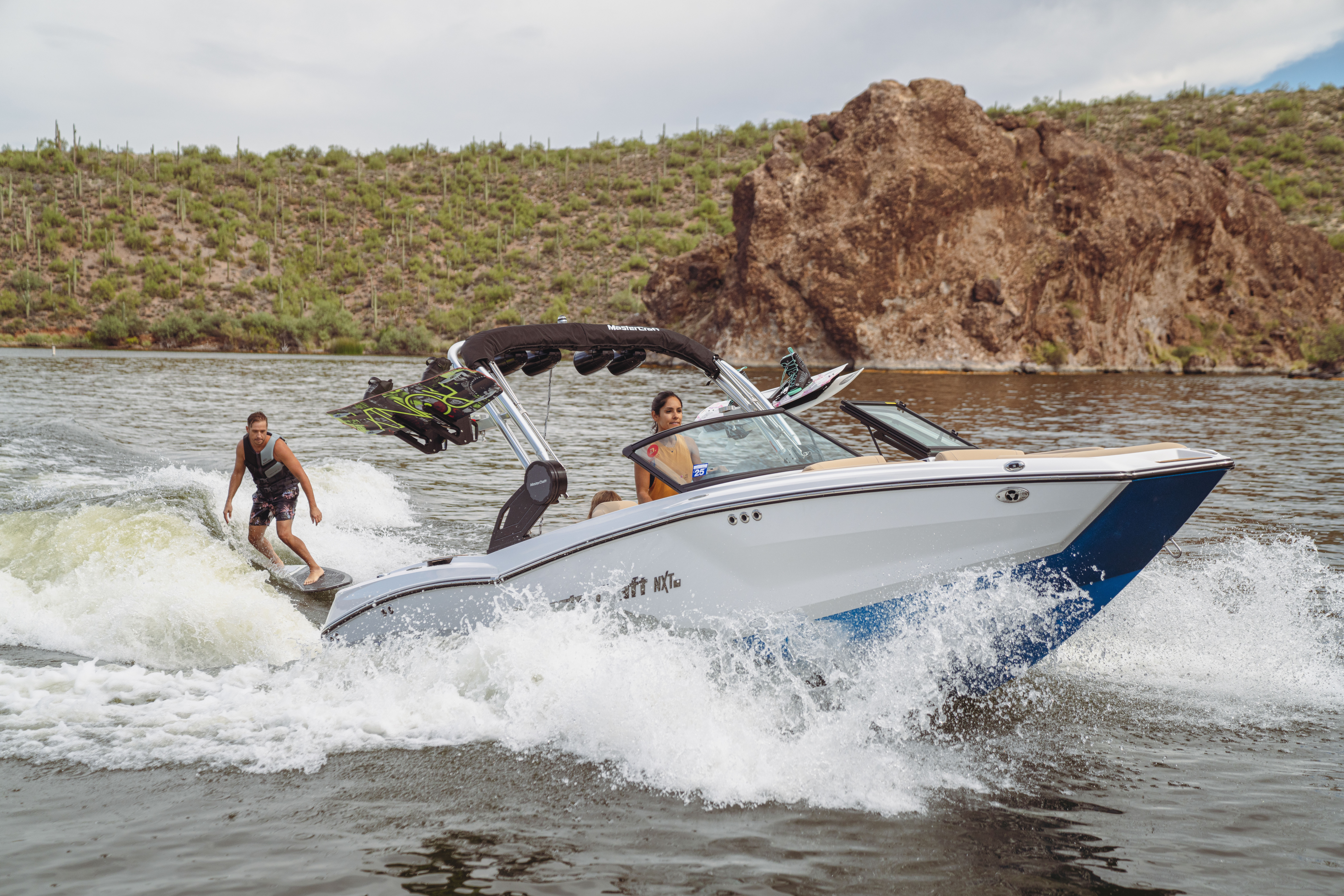 Wakesurfing on a speed boat at Canyon Lake Marina's Boat Club!